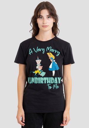 Black t-shirt featuring a graphic print with Alice and characters, text reading "A Very Merry UNBIRTHDAY To Me," in vibrant colors and playful design.