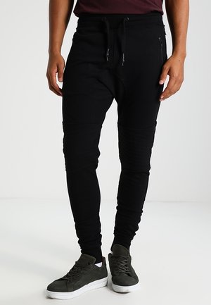 Pantalones deportivos - black