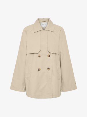 Beige dobbeltradet trenchcoat med bred krave, lange ærmer, to for- lommer og brune knapper. Glat, letvægtsstof.