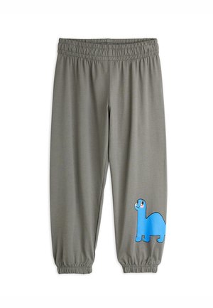 Pantalons de survêtement gris avec taille élastique et poignets resserrés. Équipés d'un graphique de dinosaure en cartoon bleu sur la jambe gauche. Texture de tissu lisse.