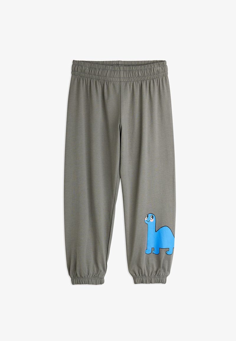 Γκρι φόρμες με ελαστική μέση και μαζεμένα μανίκια. Διαθέτουν μια μπλε καρτούν δεινόσαυρο γραφικών στο αριστερό πόδι. Λείος υφασμάτινος υφή.