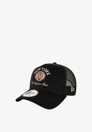 Cappellino in corduroy nero con retro in mesh, ricamo "NEW YORK" e design baseball, chiusura regolabile a scatto, con etichetta New Era bianca.