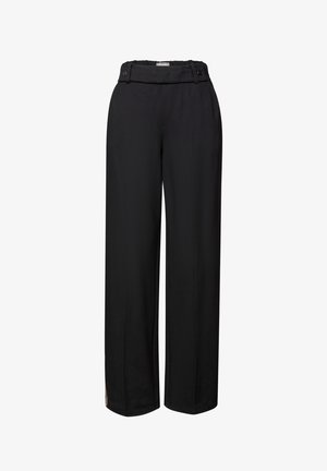 Black wide-leg trousers made of smooth fabric feature a high waist with button accents and slits at the hem. Tailored for a relaxed fit.