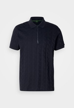 Navy blue polo shirt with short sleeves, textured geometric pattern, zip closure, and a collar. Manufacturer logo present on the chest.