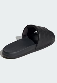 Black slide sandal with a textured rubber sole, three horizontal strap accents, and a cushioned footbed featuring “CLOUDfoam” branding.