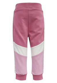Bomullssweatpants med en design i rosa och vitt färgblock, med avsmalnande ben och ribbade muddar. Mjuk textur, elastisk midja.