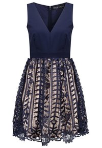 Námořnické šaty bez rukávů s výstřihem do V, přiléhavým korzetem a béžovou podšívkou pod námořnickou krajkovou suknią s květinovým vzorem a scalloped lem.