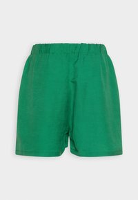 Shorts en coton vert avec un cinturón élastique, présentant une coupe décontractée et des bords nets pour le confort et la liberté de mouvement.