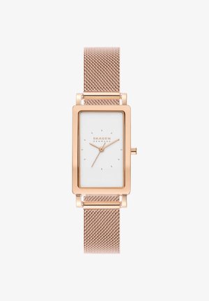 Montre-bracelet rectangulaire en or rose avec cadran blanc, marqueurs minimalistes et bracelet en maille, affichant l'heure 10:10:36, marque Skagen Denmark.