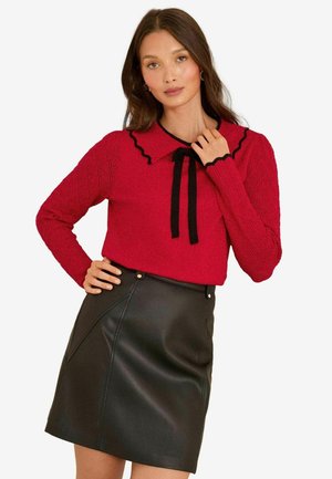 - Sweter