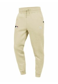 Helle beige Sweatpants aus weichem Baumwollgemisch, mit elastischem Bund, Kordelzug und gesticktem New York Yankees-Logo.