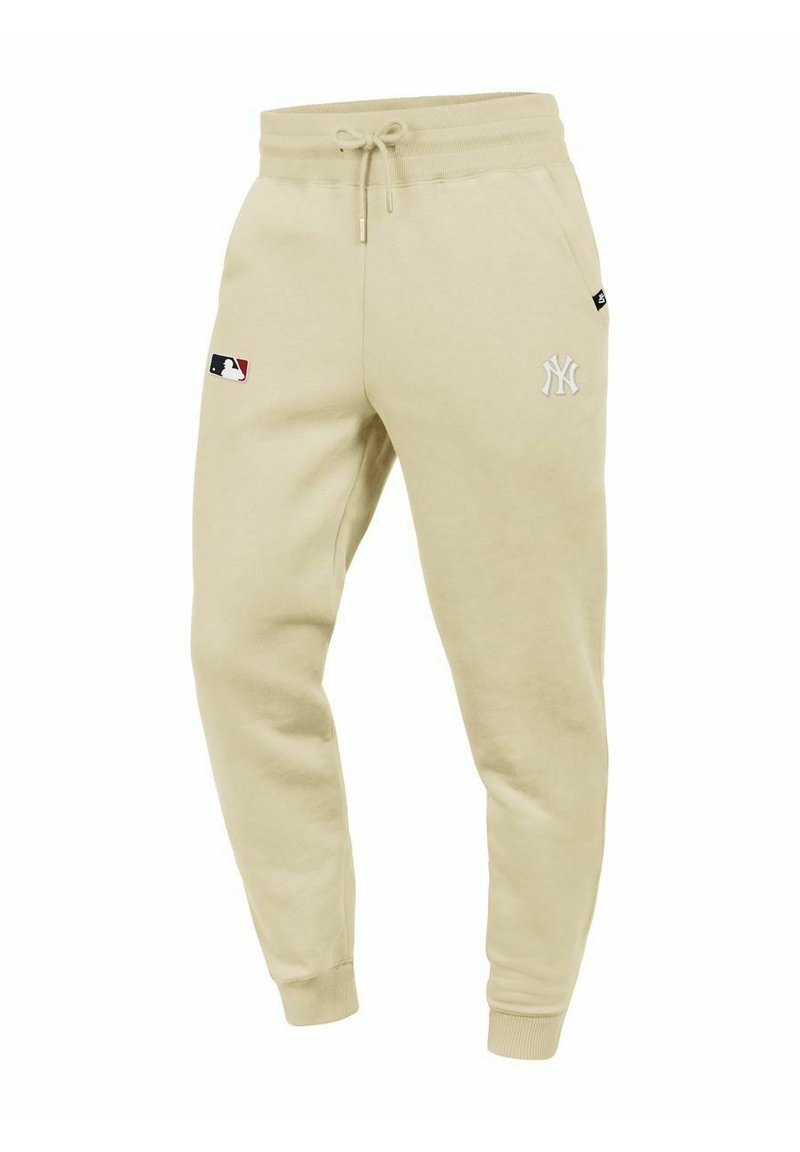 Helle beige Sweatpants aus weichem Baumwollgemisch, mit elastischem Bund, Kordelzug und gesticktem New York Yankees-Logo.