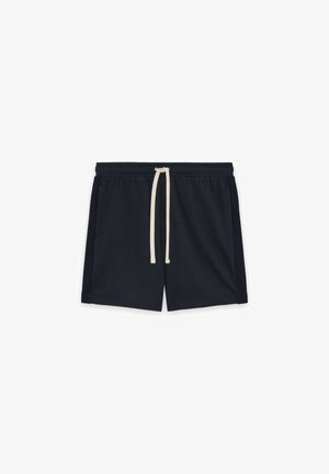 Shorts décontractés noirs avec une taille élastique et un cordon blanc, dotés de poches latérales et d'un ourlet simple et droit.