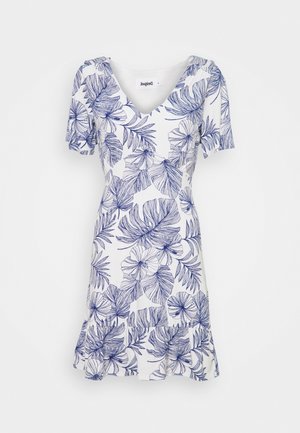 Robe blanche manches courtes avec col en V et imprimé botanique bleu de feuilles et fleurs, ourlet à volants, silhouette longueur genou.