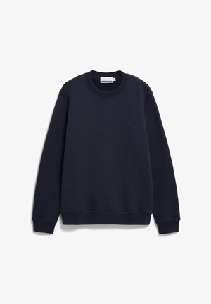Sweatshirt blu navy in cotone, con scollatura a girocollo, polsini a costine e un logo discreto sul petto. Tessuto morbido, vestibilità comoda.