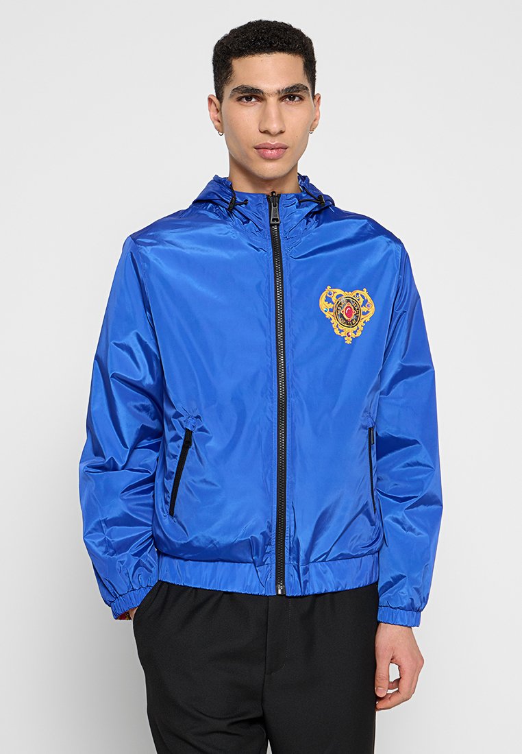 Versace Jeans Couture Lichte jas blauw Versace Jeans Couture Lichte jas blauw