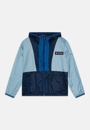 Jachetă ușoară de culoare albastră și albastră deschisă, cu fermoar în față, glugă, manșete elastice și logo-ul Columbia pe piept.