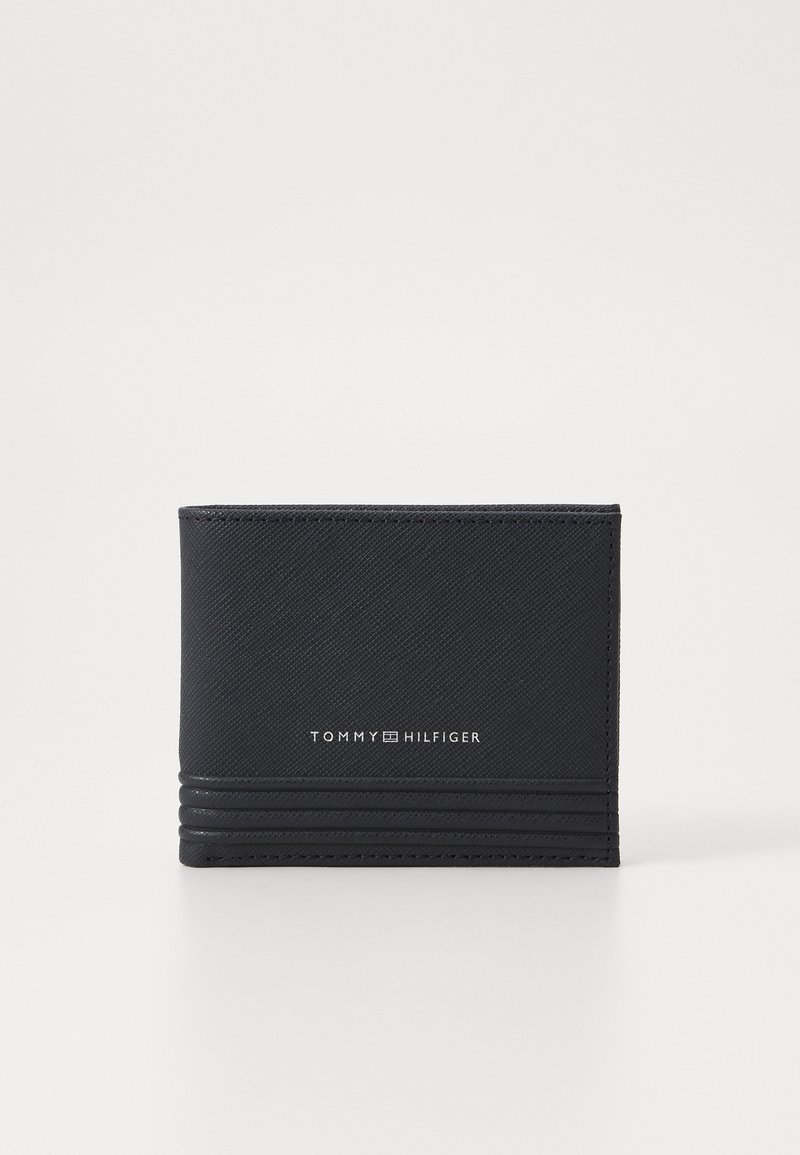 Black card holder made of textured synthetic material, featuring a logo and vertical accent lines on the front. Compact design.