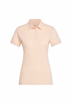 Short-sleeve polo shirt in soft peach fabric, featuring a collar, three buttons, and a white logo accent on the left sleeve.