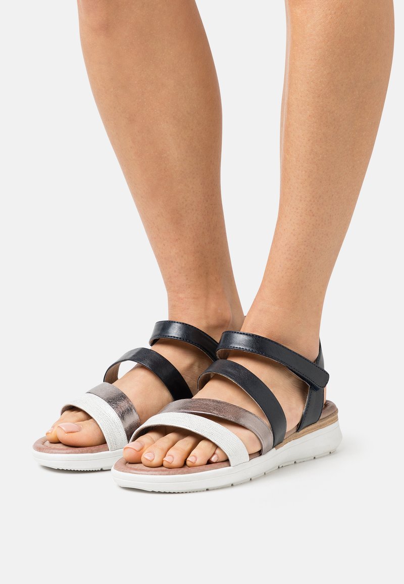 janna perforated wedge sandal