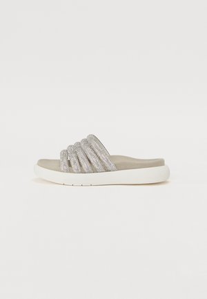 Glittery slide sandals with a smooth gray base, featuring five textured, shimmering straps and a thick white sole. Soft footbed for comfort.