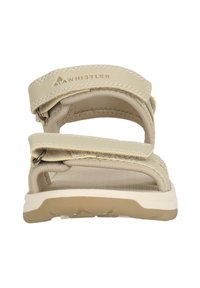 Beige Sandale mit verstellbaren Riemen, strukturiertem Fußbett und leichter Gummisohle. Mit Logo auf dem Riemen und Metallbeschlägen für einen sicheren Halt.