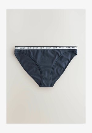 Culotte de bikini en coton bleu marine foncé avec une ceinture élastique blanche portant le texte "NEXT." Texture lisse et design classique couvrant.
