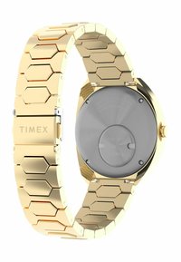 Guld metal ur med et sekskantet led-armbånd. Har en bagside i rustfrit stål og en krone på siden til justeringer.