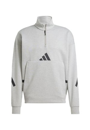 Gray pullover with a half-zip design, a front pocket, and black accent stripes on sleeves. Made of soft, textured fabric.