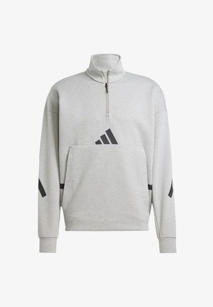 Grauer Pullover mit einem halben Reißverschluss, einer Fronttasche und schwarzen Akzentstreifen an den Ärmeln. Aus weichem, strukturiertem Stoff gefertigt.