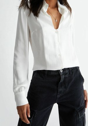 Blusa - white