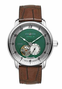 Automatische Uhr mit einem grünen marmorierten Zifferblatt, silbernem Gehäuse, klaren Stundenmarkierungen, kleinem Unterzifferblatt und braunem Lederarmband mit Krokodilprägung.