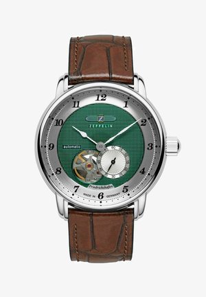 Automatische Uhr mit einem grünen marmorierten Zifferblatt, silbernem Gehäuse, klaren Stundenmarkierungen, kleinem Unterzifferblatt und braunem Lederarmband mit Krokodilprägung.