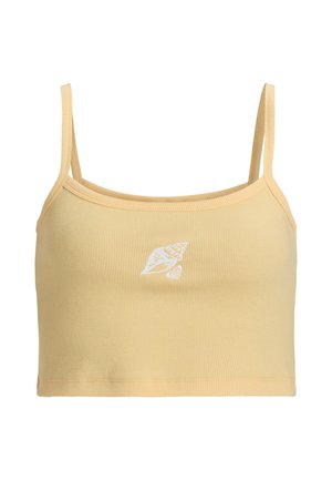 Gul ribbad crop top med tunna band, med en vit snäckgrafik i mitten. Tillverkad av ett elastiskt material, har den en åtsittande design.