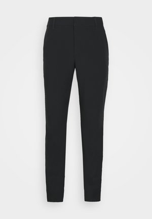 Sorte slim-fit bukser med bæltestropper, frontlukning og tilspidsede ben, vist på en ensartet hvid baggrund.