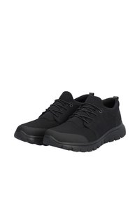 Black athletic shoes featuring a mix of textured and smooth synthetic materials, lace-up design, and a flexible rubber sole.
