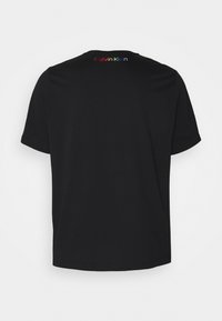 Calvin Klein T-shirt med print - black