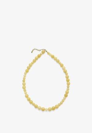 Colier cu mărgele rotunde galbene de dimensiuni variate și închizătoare ajustabilă cu lanț de culoare aurie pe fundal alb.