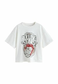 Biała krótka koszulka z grafiką zespołu Rolling Stones, z czerwonymi błyszczącymi ustami i językiem w leopardzi wzór. Krótkie rękawy i luźny krój.