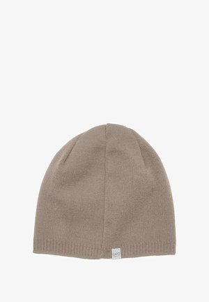 Beanie hat in light taupe, ribbed texture, soft knit material, featuring a small rectangular fabric label with "CAPO" at the hem.