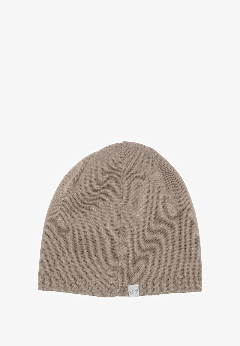 Beanie hat in light taupe, ribbed texture, soft knit material, featuring a small rectangular fabric label with "CAPO" at the hem.