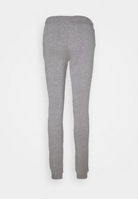 Fitted Sweatpants in heathergrau mit elastischem Bund und Bündchen, von hinten auf einem weißen Hintergrund gezeigt.