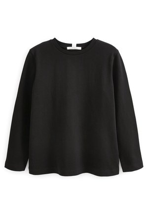 Chemise noire à manches longues avec col rond, présentée à plat, en tissu simple et lisse sans motifs ni logos visibles.