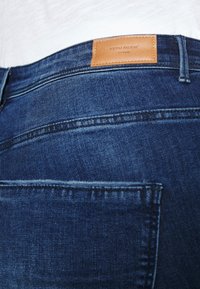 Vero Moda Curve VMTANYA CURVE HIGH WAIST - Jegging - dark blue denim