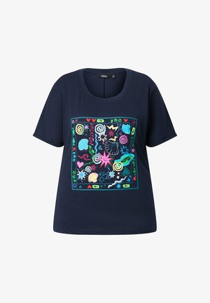 Navy blue short-sleeve shirt with a colorful square print of seashells, stars, hearts, and the word "VACATION" in the center.