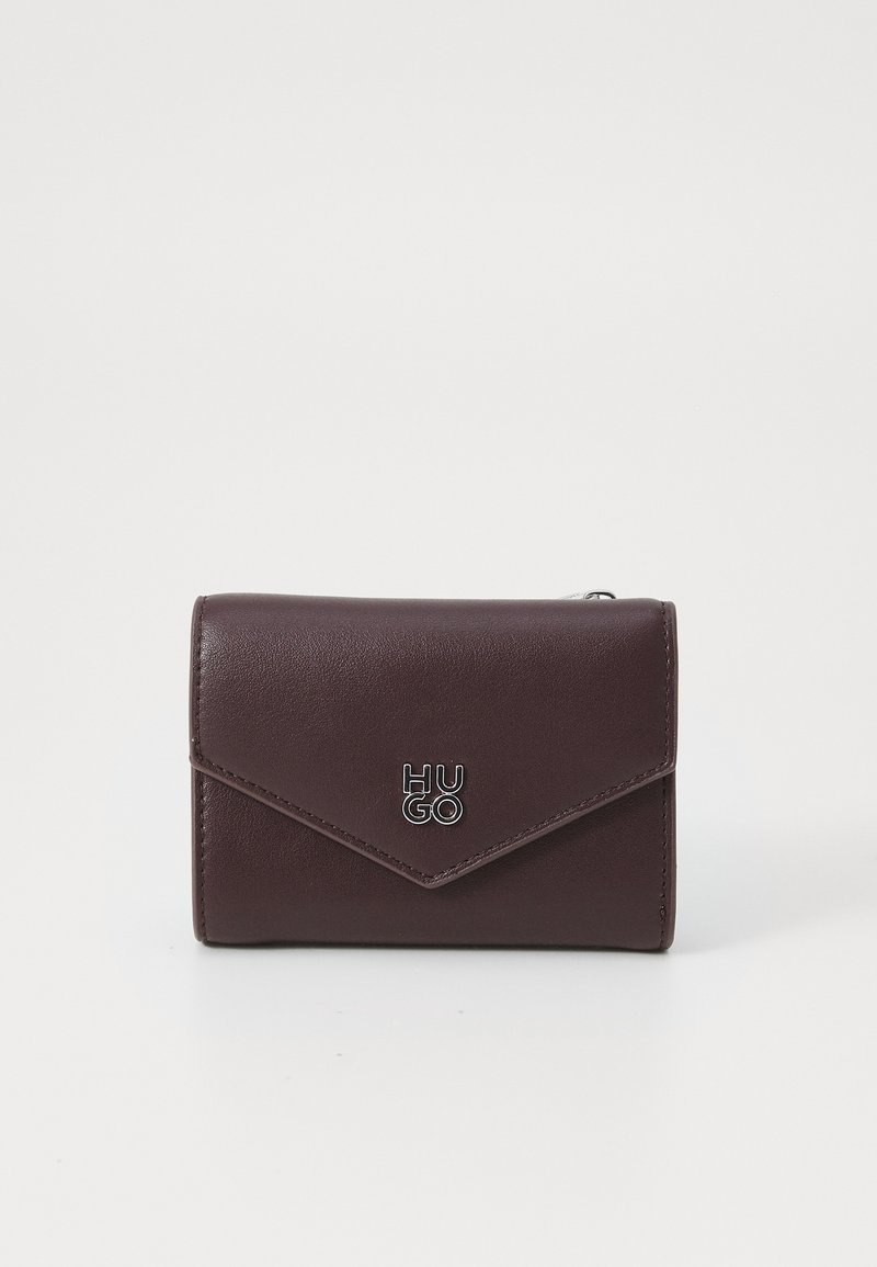 Dark burgundy leather wallet with a flap closure, silver logo accent, and smooth texture. Compact rectangular shape for convenience.