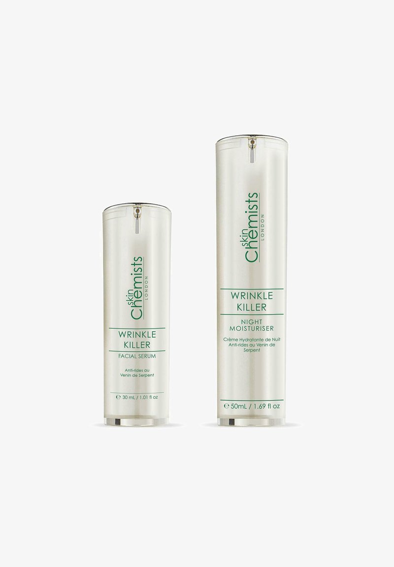 Two white cylindrical skincare bottles labeled "Skin Chemists London Wrinkle Killer," one facial serum 30ml and one night moisturizer 50ml.