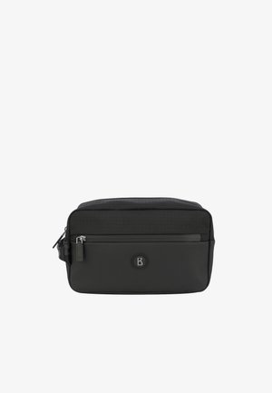Sac messager noir avec un dessus en tissu texturé, un fond lisse, une poche zippée à l'avant et un accent logo au centre. Forme compacte et rectangulaire.