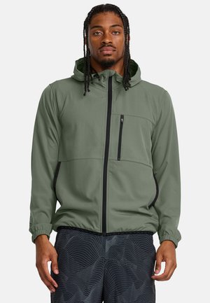 Green lightweight jacket with a hood, featuring a zippered chest pocket, elastic cuffs, and side panels with black accents.