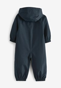 Combinaison étanche bleu marine avec capuche, poignets élastiqués et texture lisse. Design intégral pour une protection et une chaleur optimales.